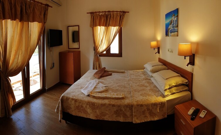 Imagen de la habitación del Hotel Apollo Studios. Foto 16