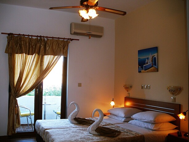Imagen de la habitación del Hotel Apollo Studios. Foto 17