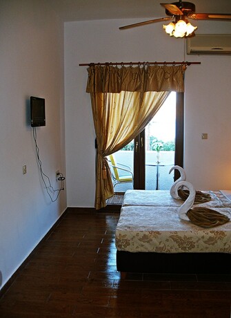 Imagen de la habitación del Hotel Apollo Studios. Foto 18