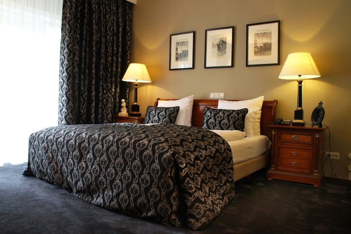 Imagen de la habitación del Hotel Apollofirst Boutique. Foto 10