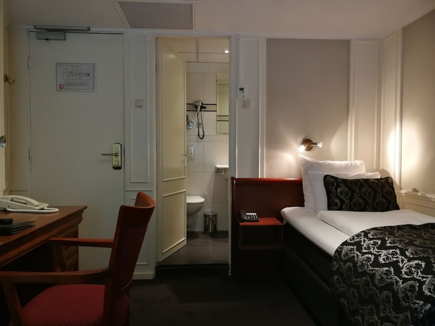 Imagen de la habitación del Hotel Apollofirst Boutique. Foto 11