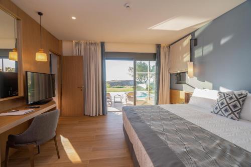 Imagen general del Hotel Apollonion Asterias Resort and Spa, Mantzivanata. Foto 6