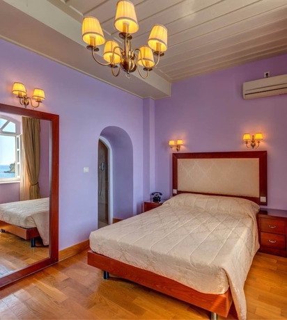 Imagen de la habitación del Hotel Apollonion Palace. Foto 9