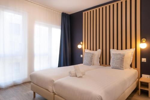 Imagen de la habitación del Hotel Appart H&ocirc;tel Le Monde Paris Pont d'ivry. Foto 16