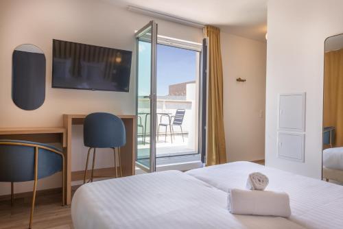 Imagen de la habitación del Hotel Appart H&ocirc;tel Le Monde Paris Pont d'ivry. Foto 18