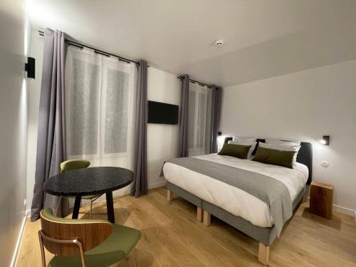 Imagen de la habitación del Hotel Appart H&ocirc;tel Victoria. Foto 16