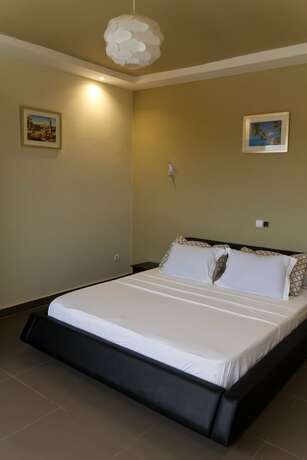 Imagen de la habitación del Hotel Appart MRode Baguida. Foto 18