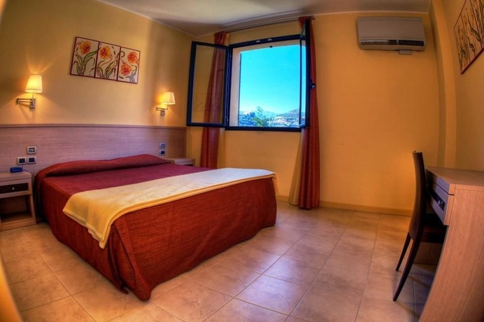 Imagen de la habitación del Hotel Appartamenti Castellaro. Foto 6
