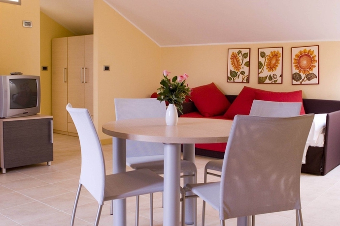 Imagen de la habitación del Hotel Appartamenti Castellaro. Foto 11