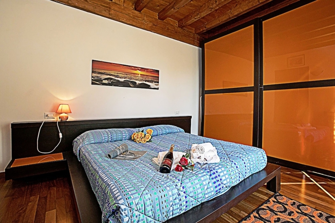 Imagen de la habitación del Hotel Appartamento Patrizia Manerba Resort. Foto 4