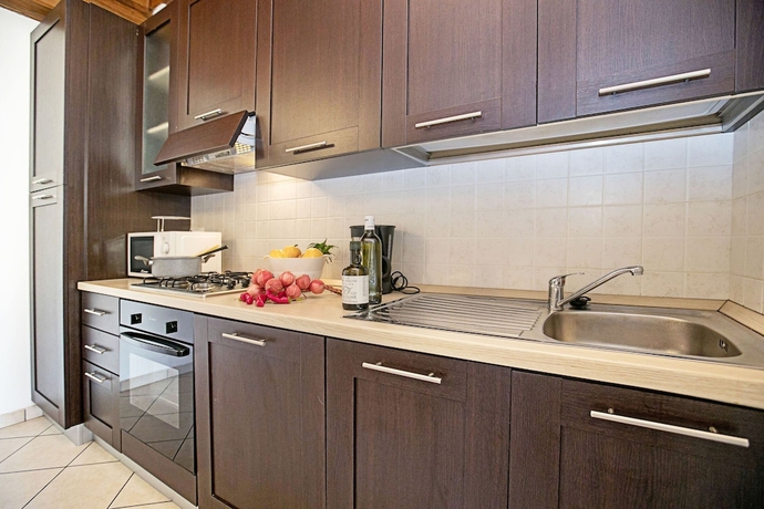 Imagen de la habitación del Hotel Appartamento Patrizia Manerba Resort. Foto 7