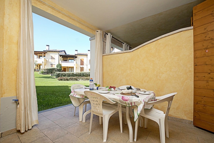 Imagen de la habitación del Hotel Appartamento Patrizia Manerba Resort. Foto 11