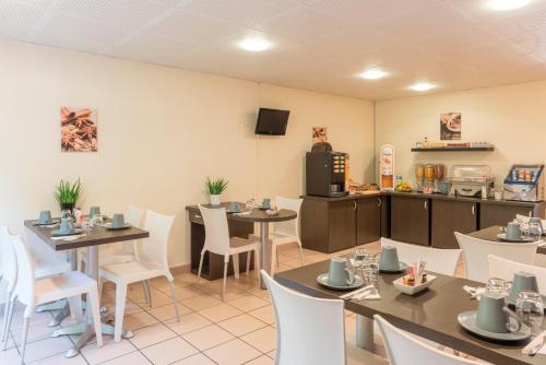 Imagen del bar/restaurante del Hotel Appart'city Classic Nantes St Herblain. Foto 6