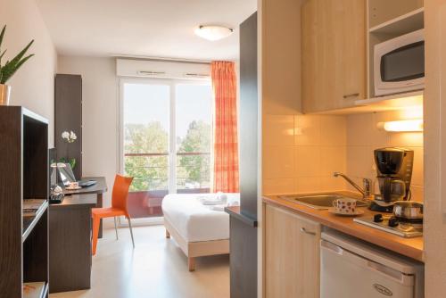 Imagen de la habitación del Hotel Appart'city Classic Nantes St Herblain. Foto 10