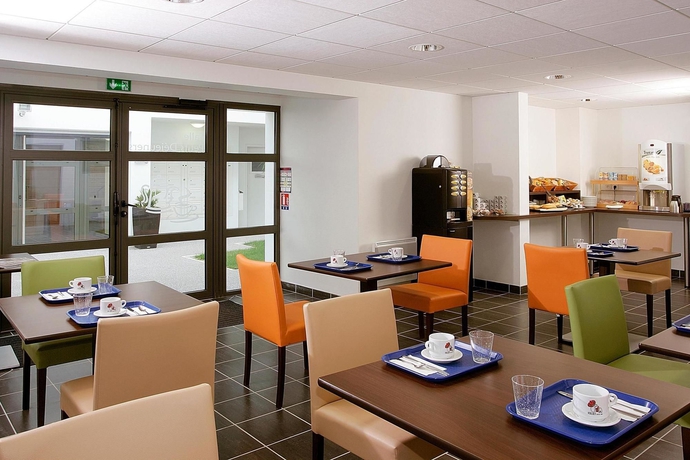 Imagen del bar/restaurante del Hotel Appart'city Confort Pau Centre. Foto 3