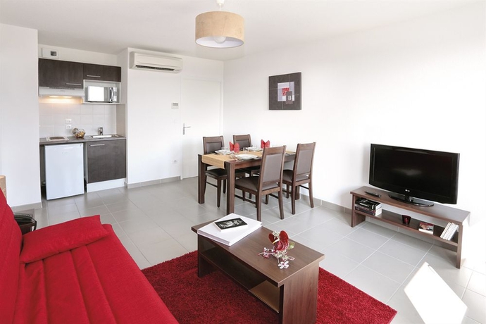 Imagen de los interiores del Hotel Appart'city Confort Toulouse Aéroport Cornebarrieu. Foto 11