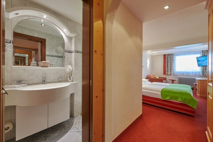 Imagen de la habitación del Hotel Appartement Roggal. Foto 17