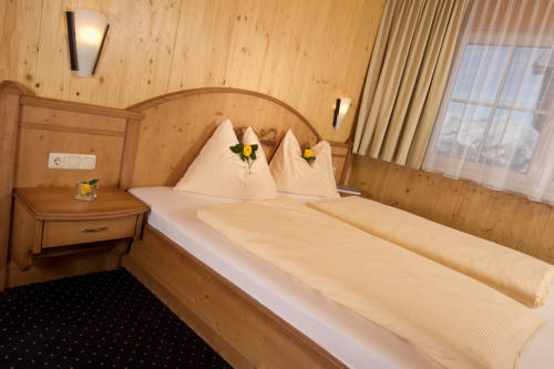 Imagen de la habitación del Hotel Appartement & Suiten Glöcknerin. Foto 6