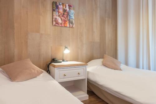 Imagen de la habitación del Hotel Appartements Les Ormes. Foto 8