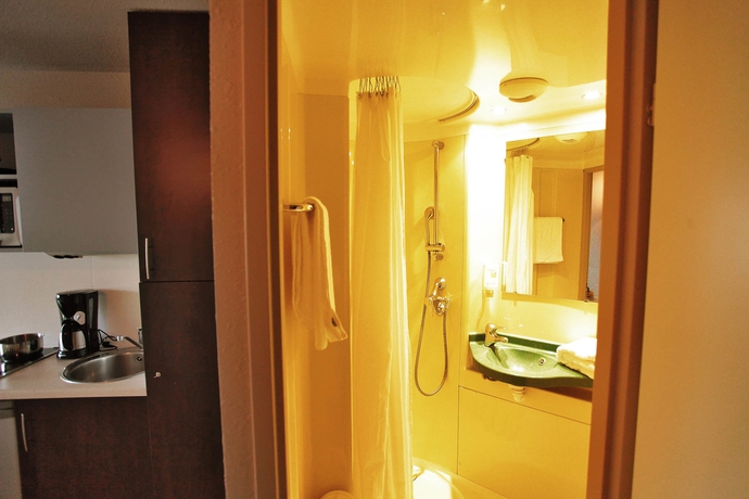 Imagen de la habitación del Hotel Apparthotel Torcy. Foto 6