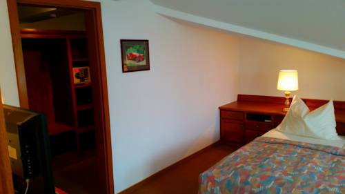 Imagen de la habitación del Hotel Appartment-hotel-h&ouml;lzl. Foto 16