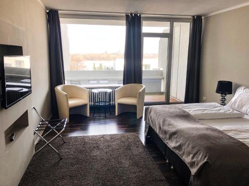 Imagen de la habitación del Hotel Appartments Rheinblick. Foto 2