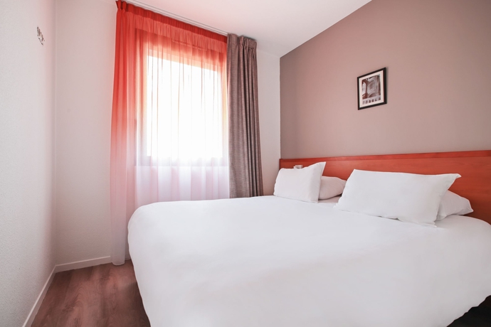 Imagen de la habitación del Hotel Appart’city Confort Lyon Gerland. Foto 3