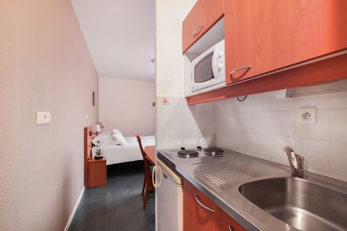 Imagen de la habitación del Hotel Appart’city Confort Lyon Gerland. Foto 11