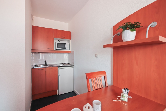 Imagen de la habitación del Hotel Appart’city Confort Lyon Gerland. Foto 13