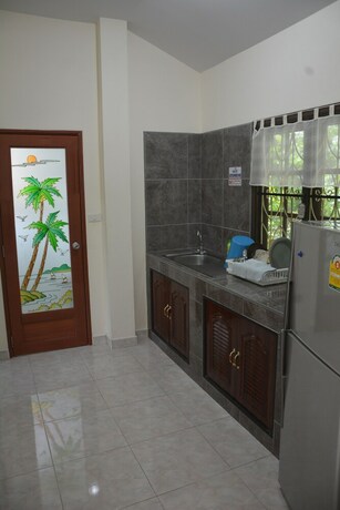 Imagen de la habitación del Hotel Apple Bungalows. Foto 7