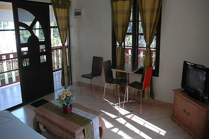 Imagen de la habitación del Hotel Apple Bungalows. Foto 11