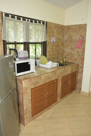 Imagen de la habitación del Hotel Apple Bungalows. Foto 14
