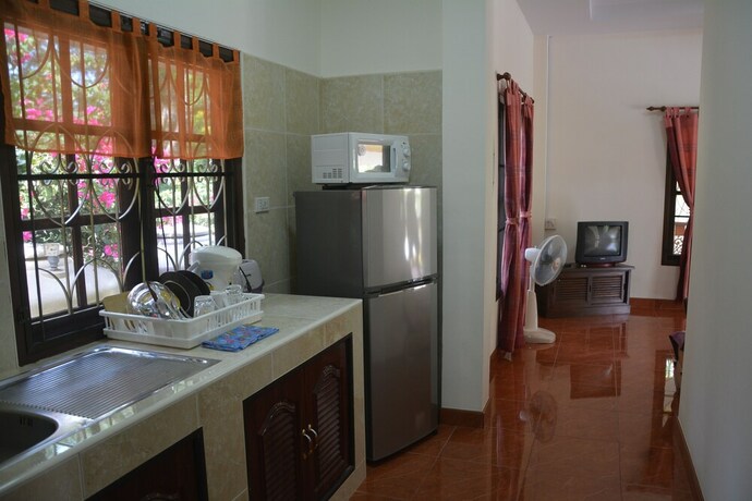 Imagen de la habitación del Hotel Apple Bungalows. Foto 15