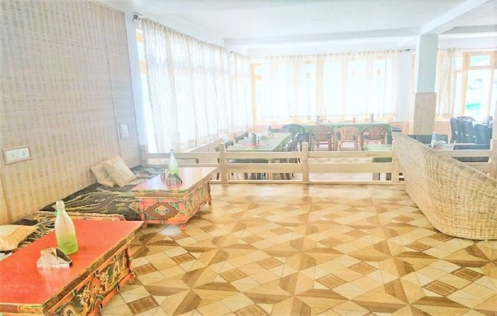 Imagen del bar/restaurante del Hotel Apple Cottage Nubra - Glamping. Foto 10