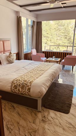 Imagen de la habitación del Hotel Apple Flower. Foto 11