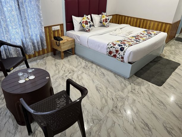 Imagen de la habitación del Hotel Apple Flower. Foto 13