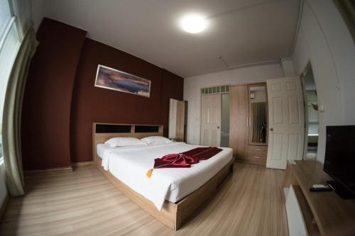 Imagen de la habitación del Hotel Apple Holiday. Foto 7