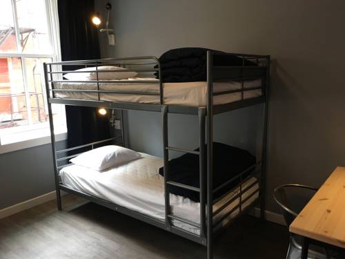 Imagen de la habitación del Hotel Apple Hostels. Foto 6