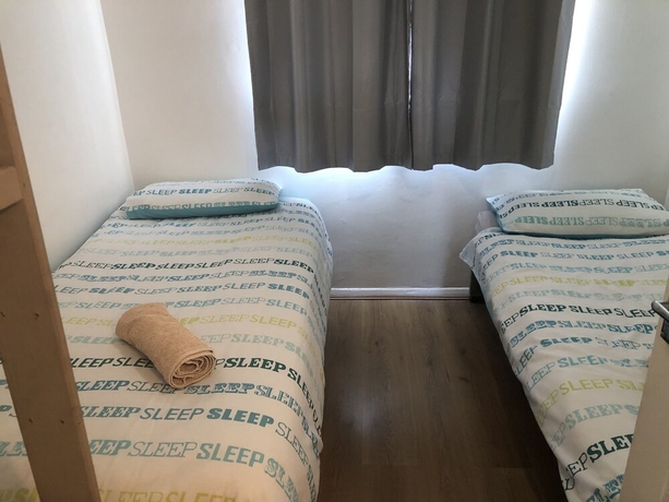 Imagen de la habitación del Hotel Apple House Guesthouse Heathrow Airport. Foto 17