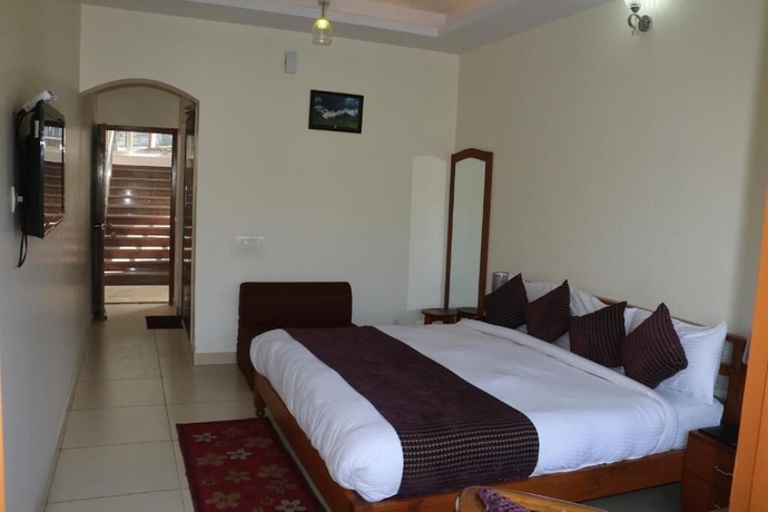 Imagen de la habitación del Hotel Apple Inn, Bohrakun. Foto 9