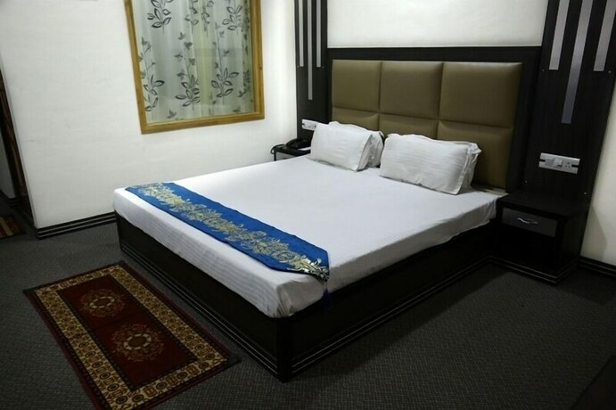 Imagen de la habitación del Hotel Apple Nest. Foto 17