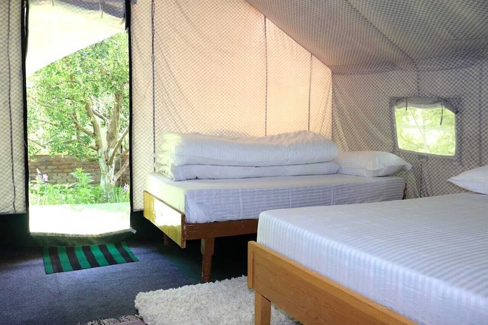 Imagen de la habitación del Hotel Apple Orchard Farm and Camping. Foto 6