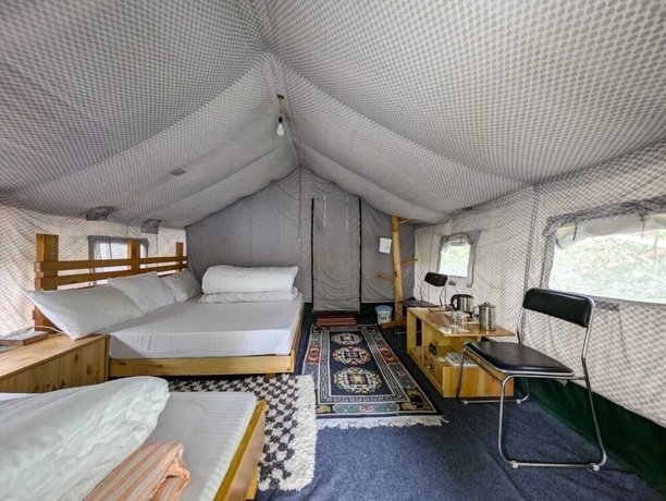 Imagen de la habitación del Hotel Apple Orchard Farm and Camping. Foto 12
