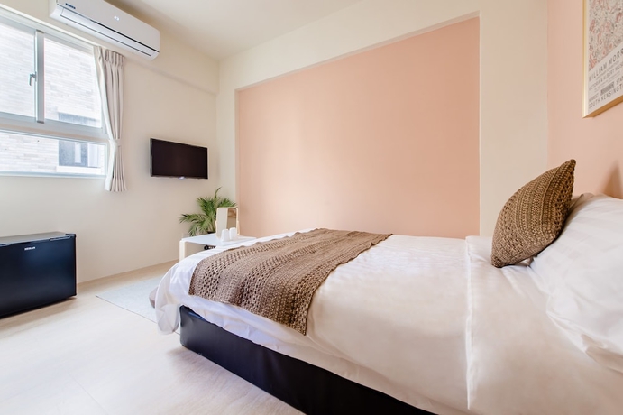 Imagen de la habitación del Hotel Apple Scent Stay. Foto 12