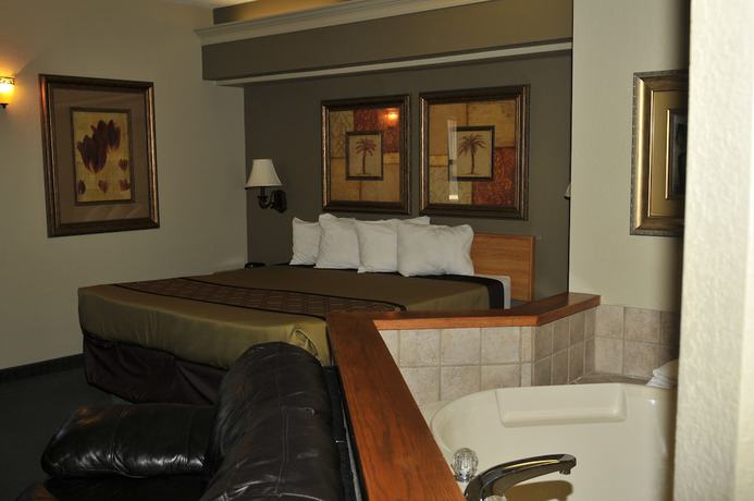 Imagen de la habitación del Hotel Apple Tree Inn And Suites. Foto 10