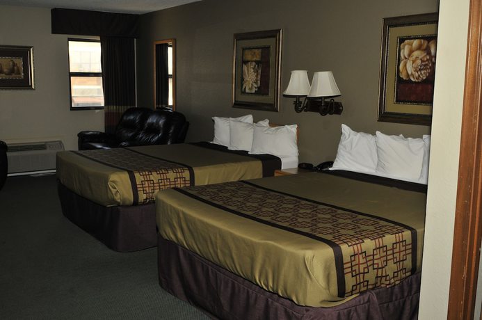 Imagen de la habitación del Hotel Apple Tree Inn And Suites. Foto 11