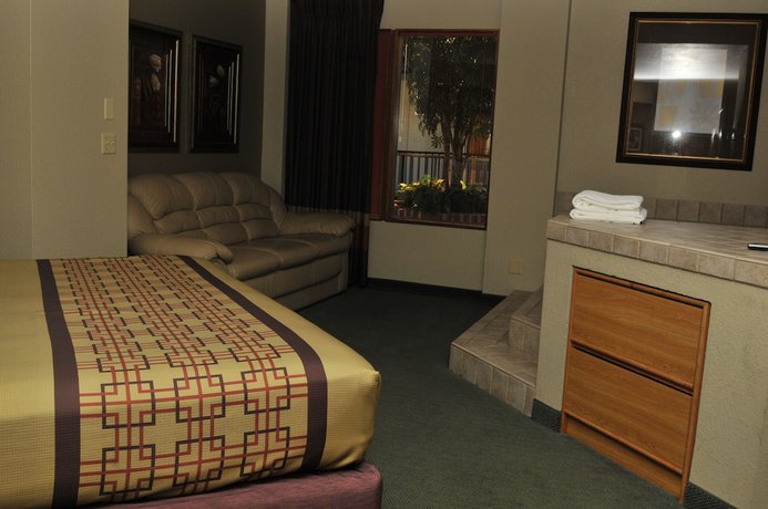 Imagen de la habitación del Hotel Apple Tree Inn And Suites. Foto 13