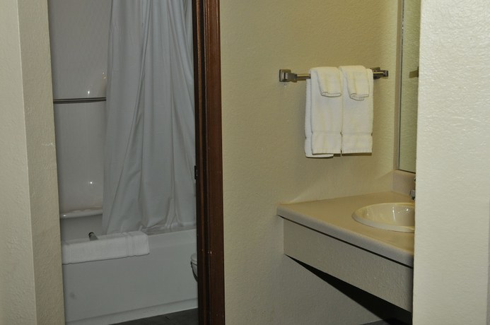 Imagen de la habitación del Hotel Apple Tree Inn And Suites. Foto 18