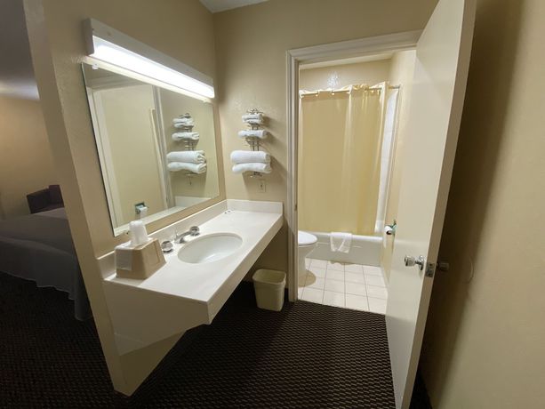 Imagen de la habitación del Hotel Apple Tree Inn Tyler Lindale. Foto 8