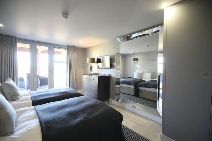 Imagen de la habitación del Hotel Apple Tree Lodges. Foto 13